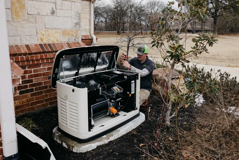 Factory-certified technician diagnosing a Generac standby generator during a repair visit in North Texas